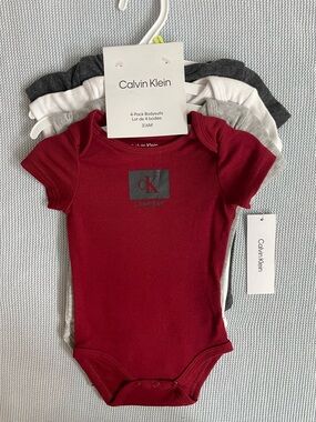 Calvin Klein  Baby  4-Pack Bodysuits Size 3-6 Months